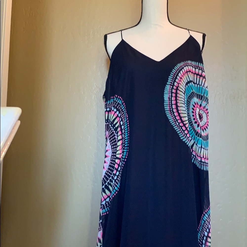 Beautiful flowing dress. Light with sexy back